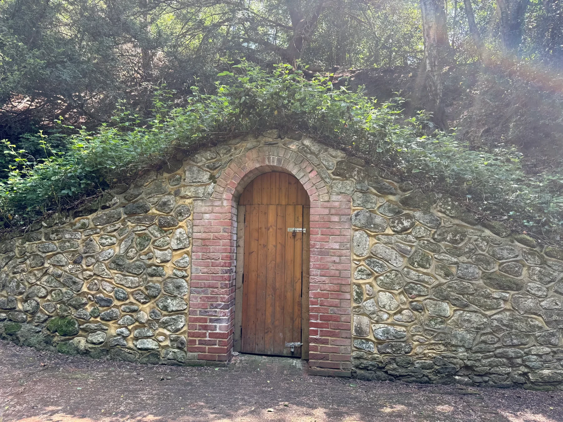 Stone doorway hidden in woodland near Westcott, Dorking.